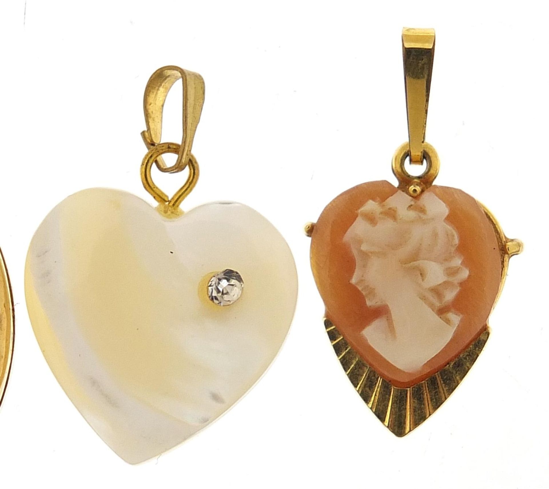 Three gold coloured pendants and a rolled gold locket including a cameo, the largest 2.8cm high, - Image 3 of 5