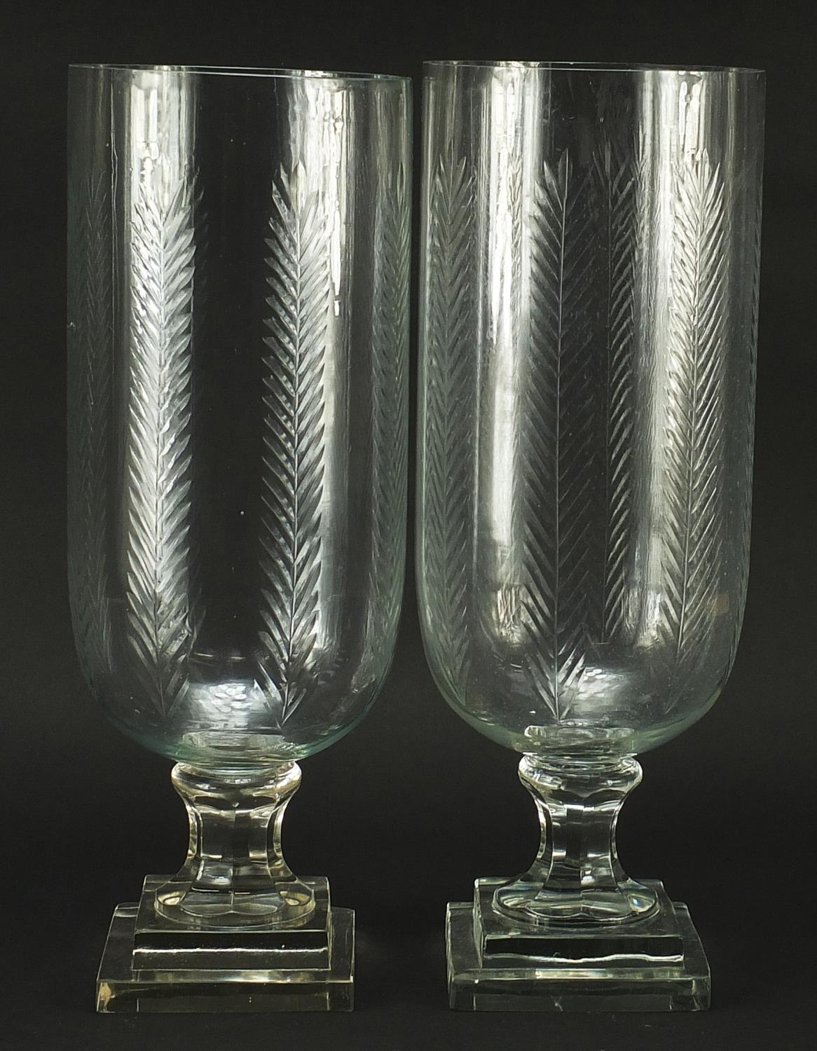 Pair of Regency style cut glass celery vases, 40cm high