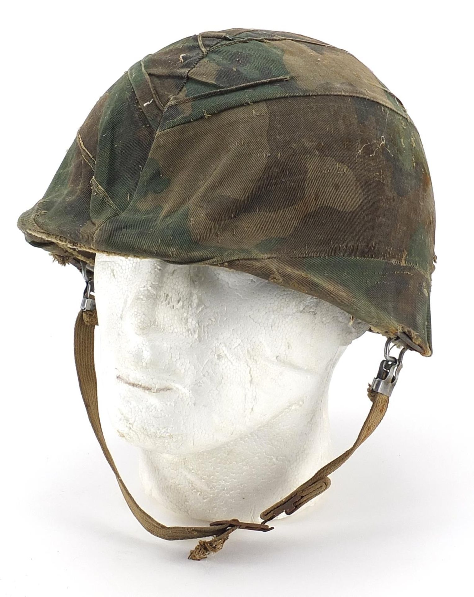 Military interest USM1 helmet with camouflage cover