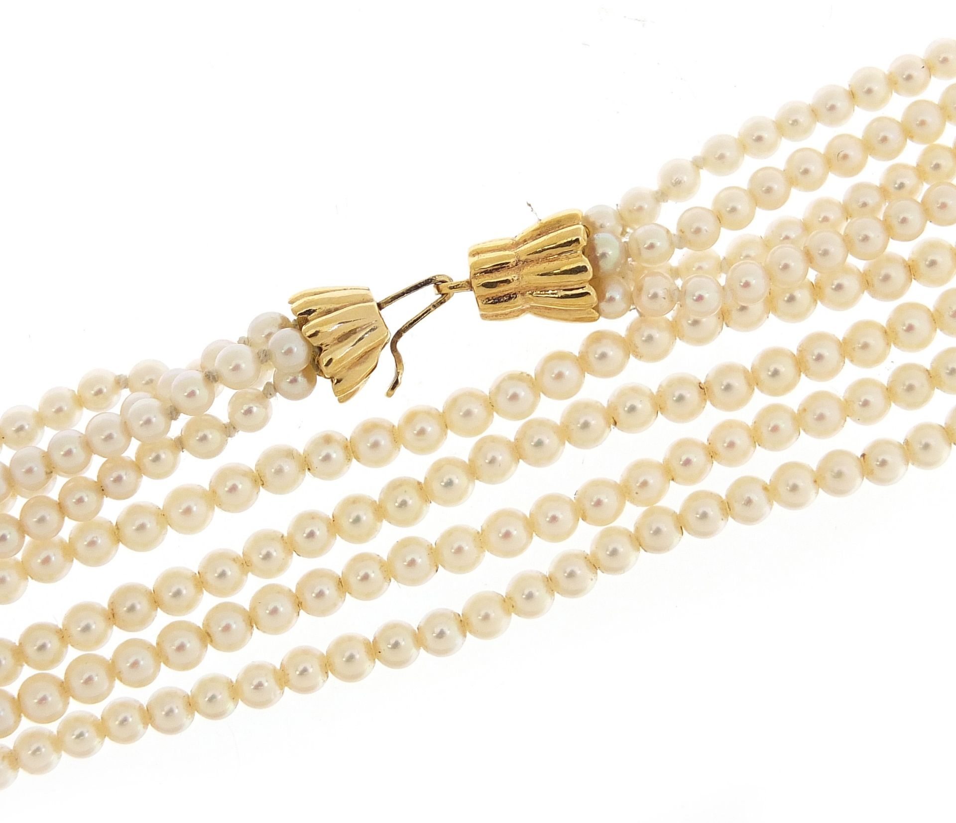Mappin & Webb four row pearl necklace with 18ct gold clasp, 45cm in length, 29.0g