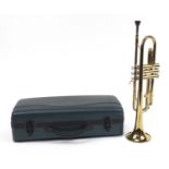 Brass trumpet with fitted protective carry case, 48cm in length