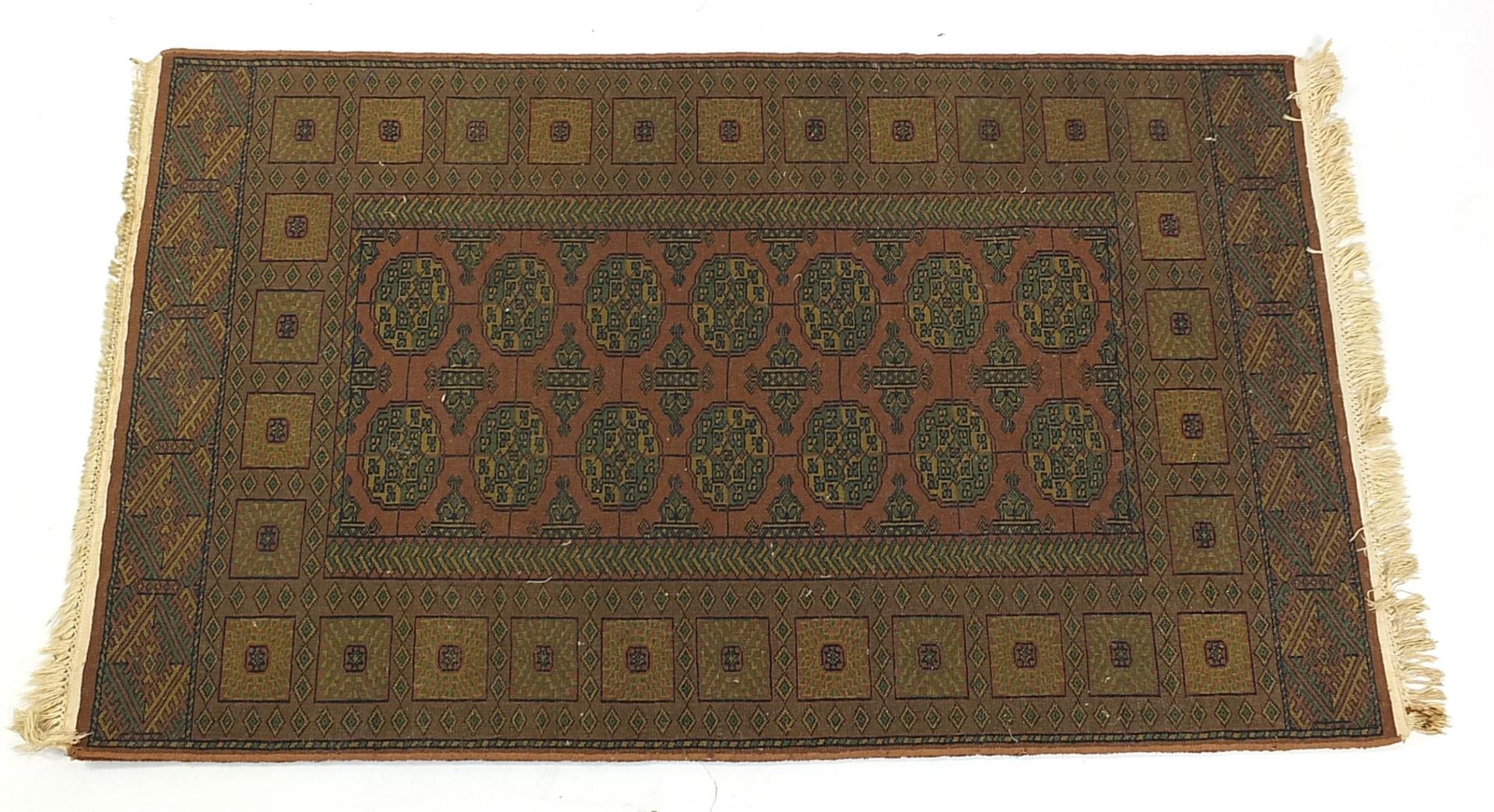 Middle Eastern green and brown ground rug with all over geometric design, 160cm x 95cm - Image 2 of 2