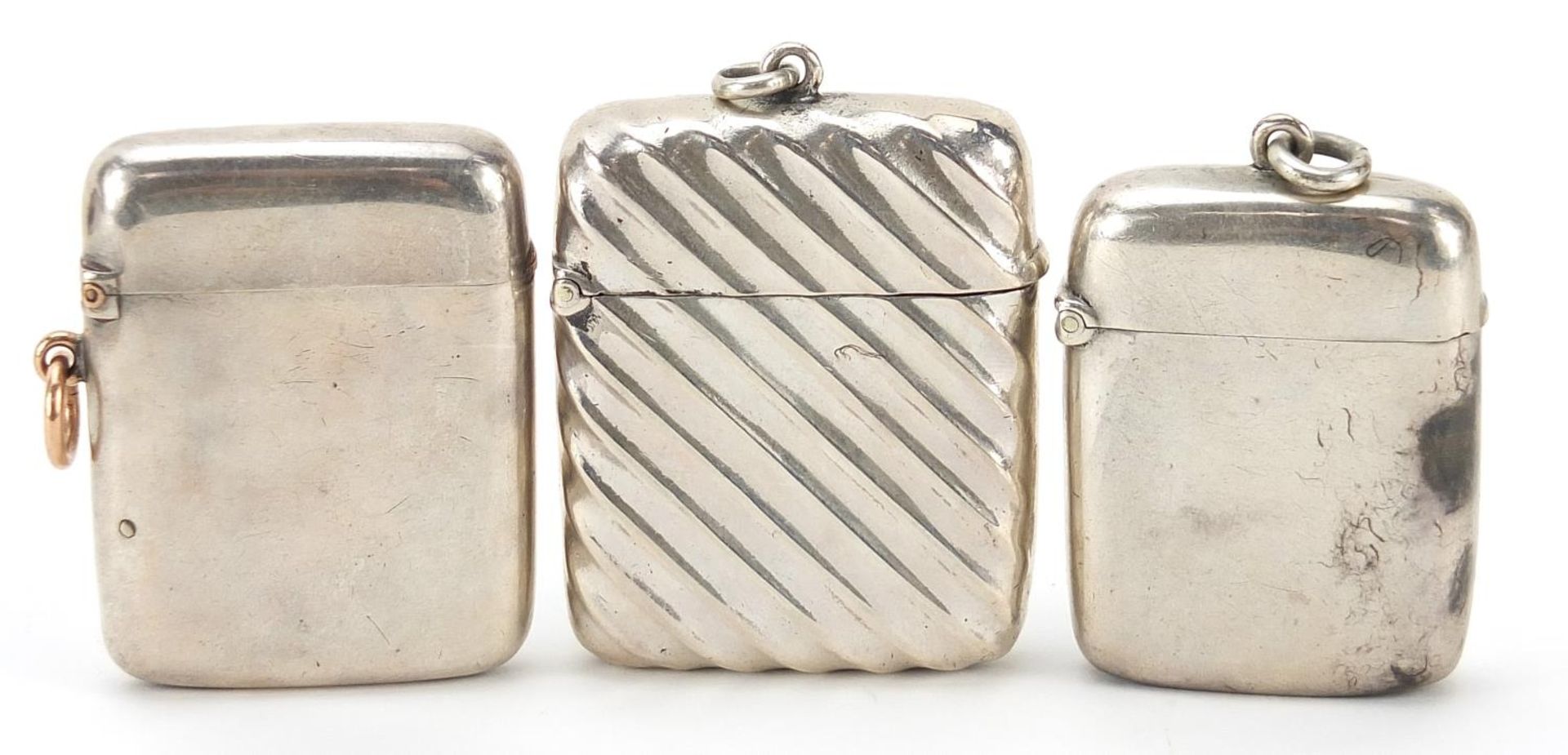 Three Victorian and later silver vestas, one embossed, the largest 5.5cm high, total weight 90.8g - Image 2 of 4