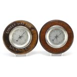 Two Guinness advertising circular oak wall barometers, each 20.5cm in diameter