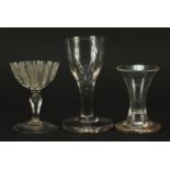 Three antique firing glasses including one with etched bowl, the largest 11.5cm high