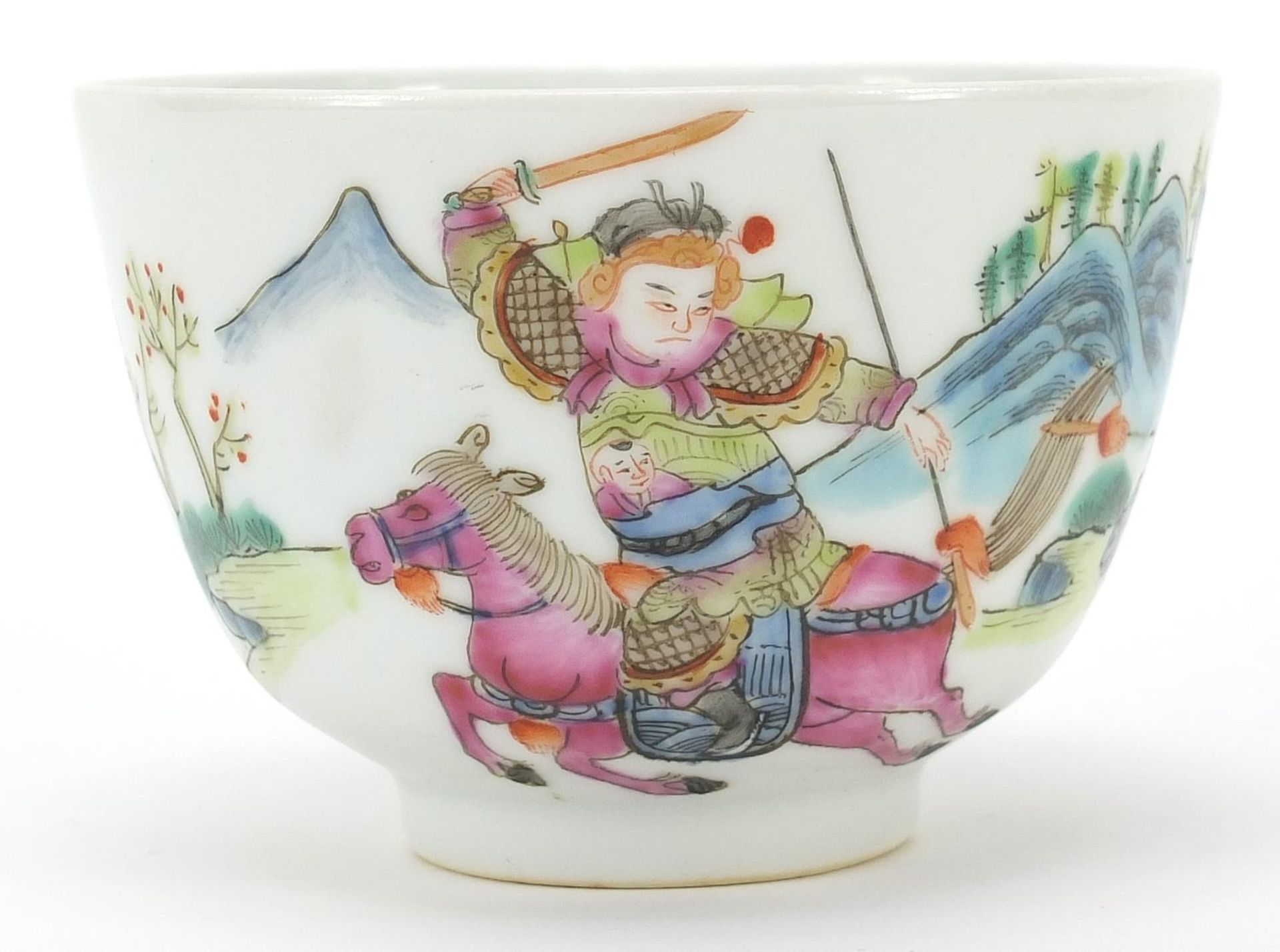 Chinese porcelain bowl hand painted in the famille rose palette with warriors on horseback,