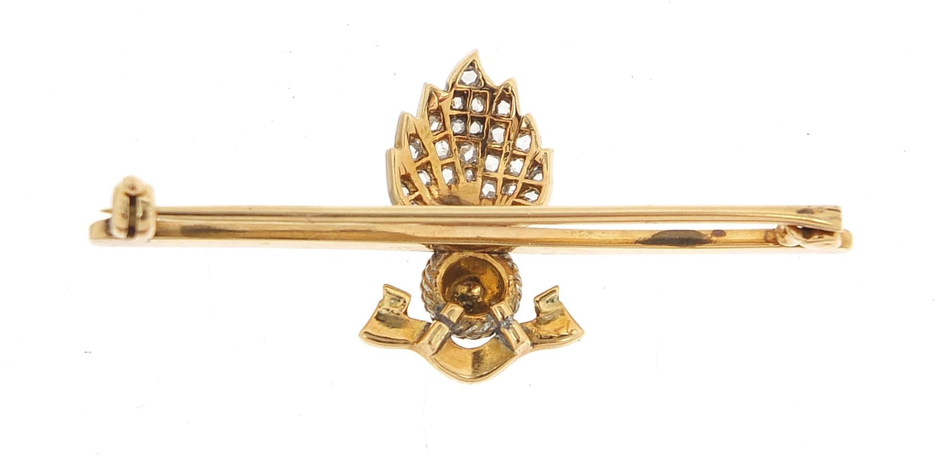 Military interest unmarked gold and enamel Ubique grenade sweetheart brooch set with diamonds, 4.5cm - Image 2 of 2