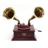 Mahogany wind up gramophone with two brass horns