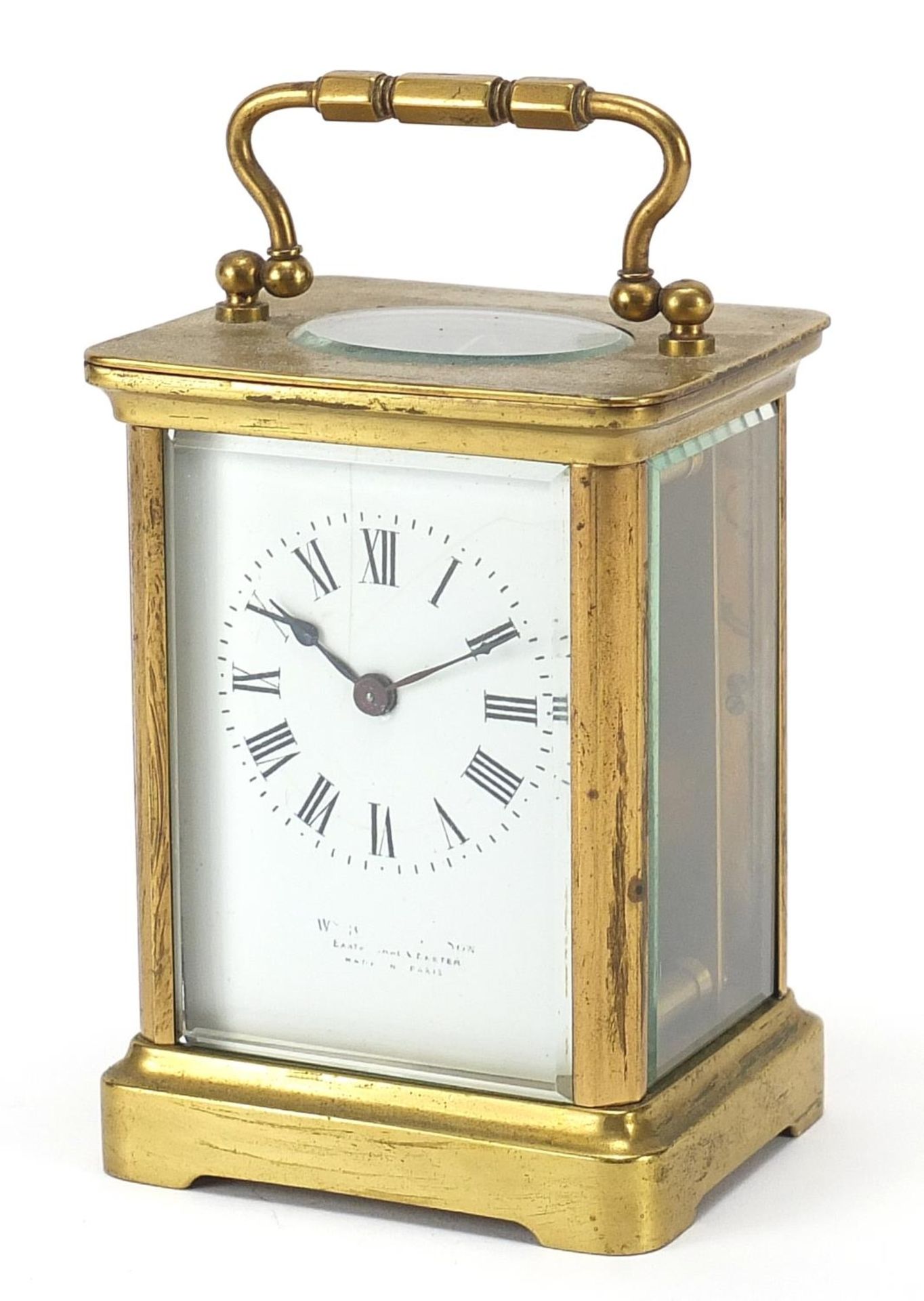 French brass cased carriage clock with enamelled dial having Roman numerals, 10.5cm high