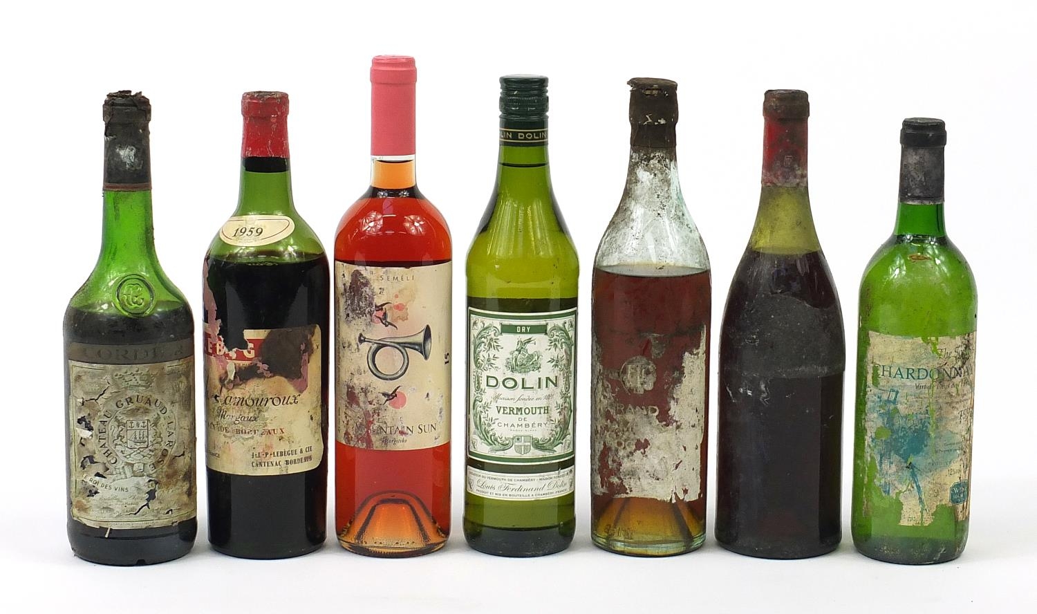 Seven bottle of vintage and later alcohol to include 1959 Lamouroux Margaux