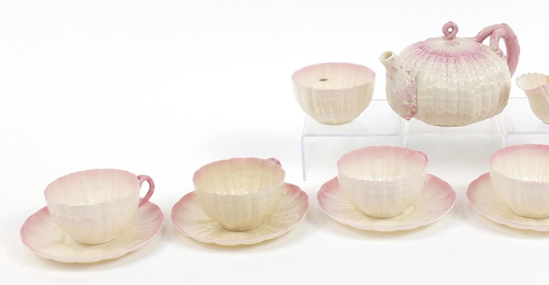 Belleek, Irish porcelain shell design six place tea service comprising teapot, six cups with - Image 2 of 4