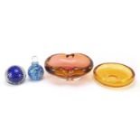 Art glassware including a heavy amber glass bowl, scent bottle with stopper and paperweight, the