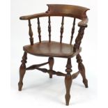 Oak smoker's bow armchair, 77cm high