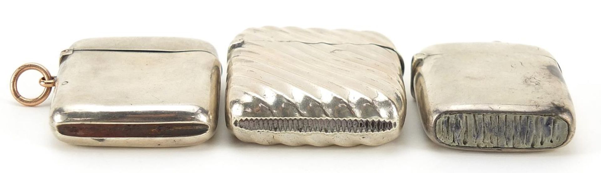 Three Victorian and later silver vestas, one embossed, the largest 5.5cm high, total weight 90.8g - Image 3 of 4