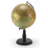 Philip's British Empire table globe with brass arch on ebonised stand, 35cm high
