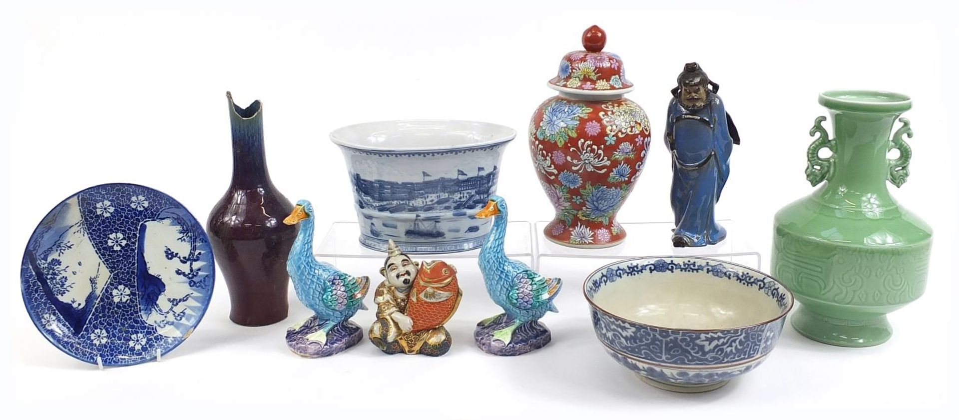 Chinese and Japanese ceramics including a pair of ducks, celadon glazed vase and baluster vase