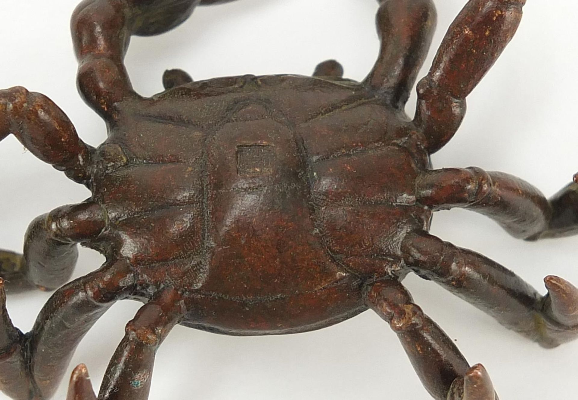 Two Japanese patinated bronze animals comprising frog and crab, each with impressed marks, the - Image 4 of 4