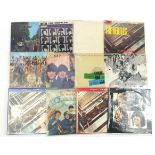 The Beatles vinyl LP's including The White Album with poster and four photographs, Abbey Road,