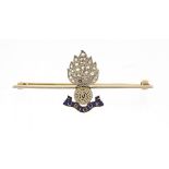 Military interest unmarked gold and enamel Ubique grenade sweetheart brooch set with diamonds, 4.5cm