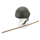 Military interest air traffic control helmet and a swagger stick