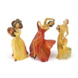 Three Wade cellulose figurines of Art Deco females, the largest 24cm high