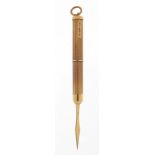 9ct gold engine turned propelling toothpick, 7.5cm in length extended, 6.7g