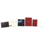 Clock and watch reference books including Breitling, Omega and Cartier
