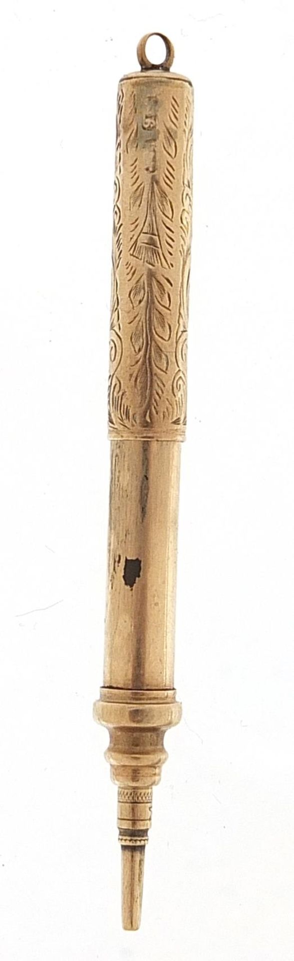 9ct gold propelling pencil with engraved decoration, 7cm in length extended, 6.3g