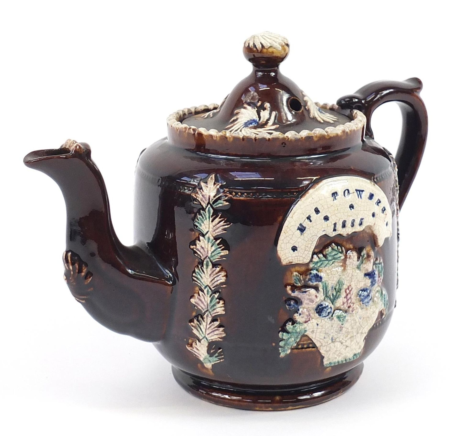 Measham treacle glazed Bargeware teapot inscribed Mrs Towers 1885, 17cm high