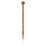Gold coloured metal propelling pencil set with an amethyst, 9.5cm in length, 6.0g
