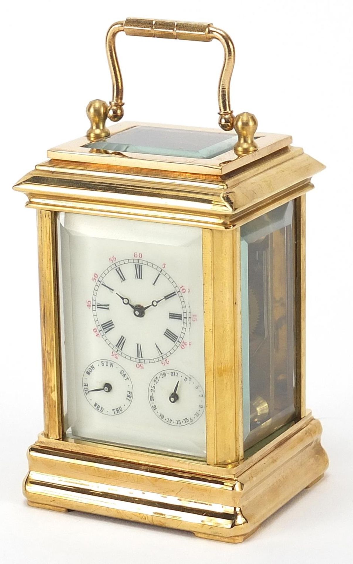 Miniature brass cased carriage clock with enamelled dial, 8.5cm high