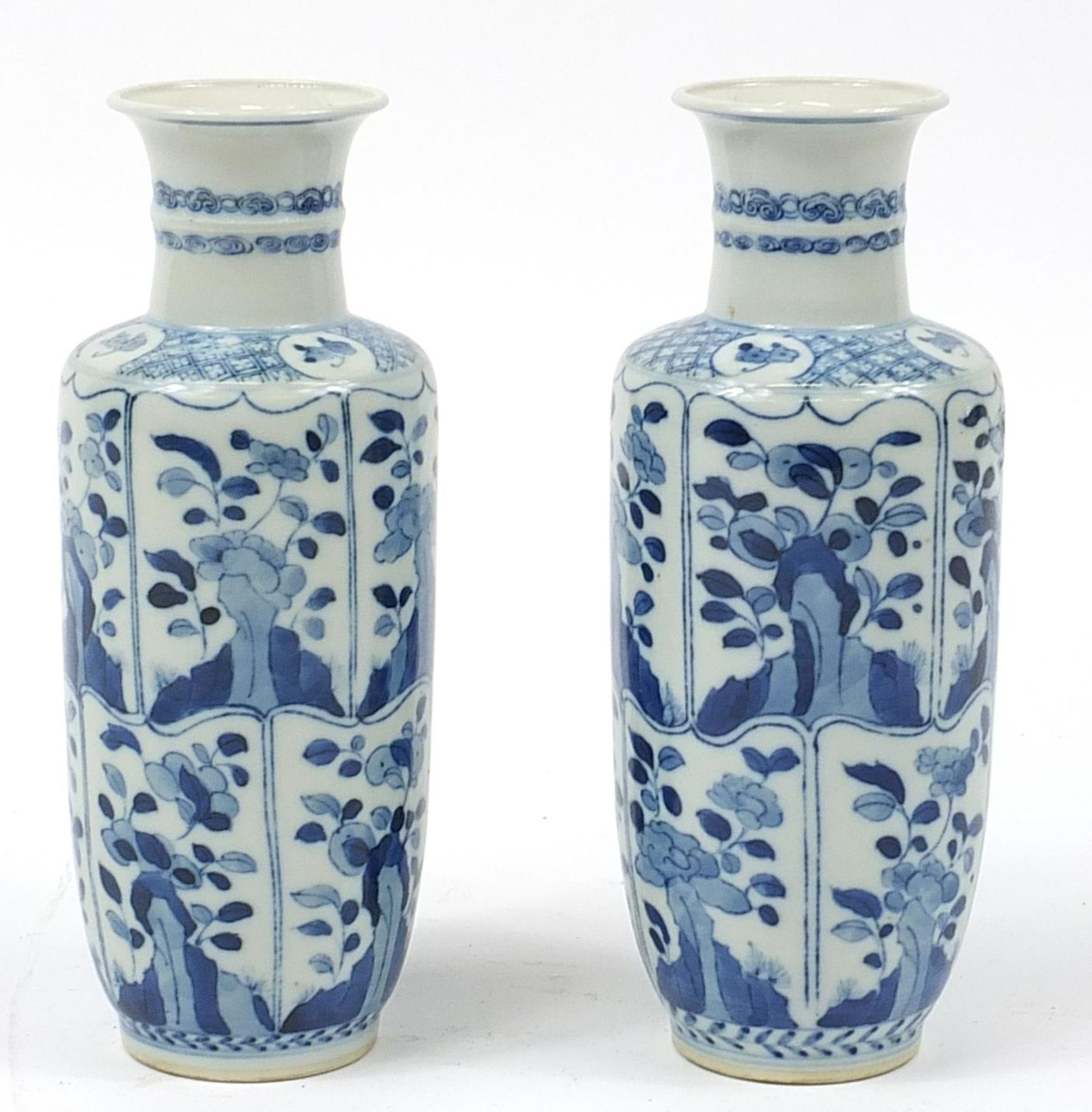 Pair of Chinese blue and white porcelain vases hand painted with panels of flowers, Kangxi blue ring - Image 2 of 3