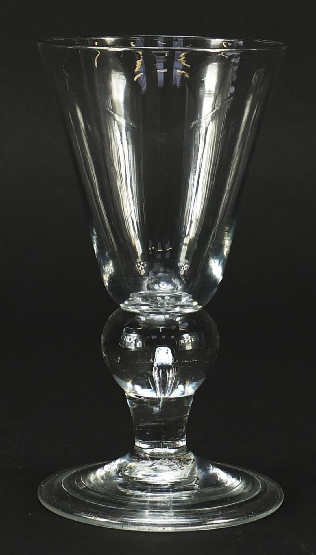 Early 18th century wine glass with folded foot and knopped stem, 12.5cm high