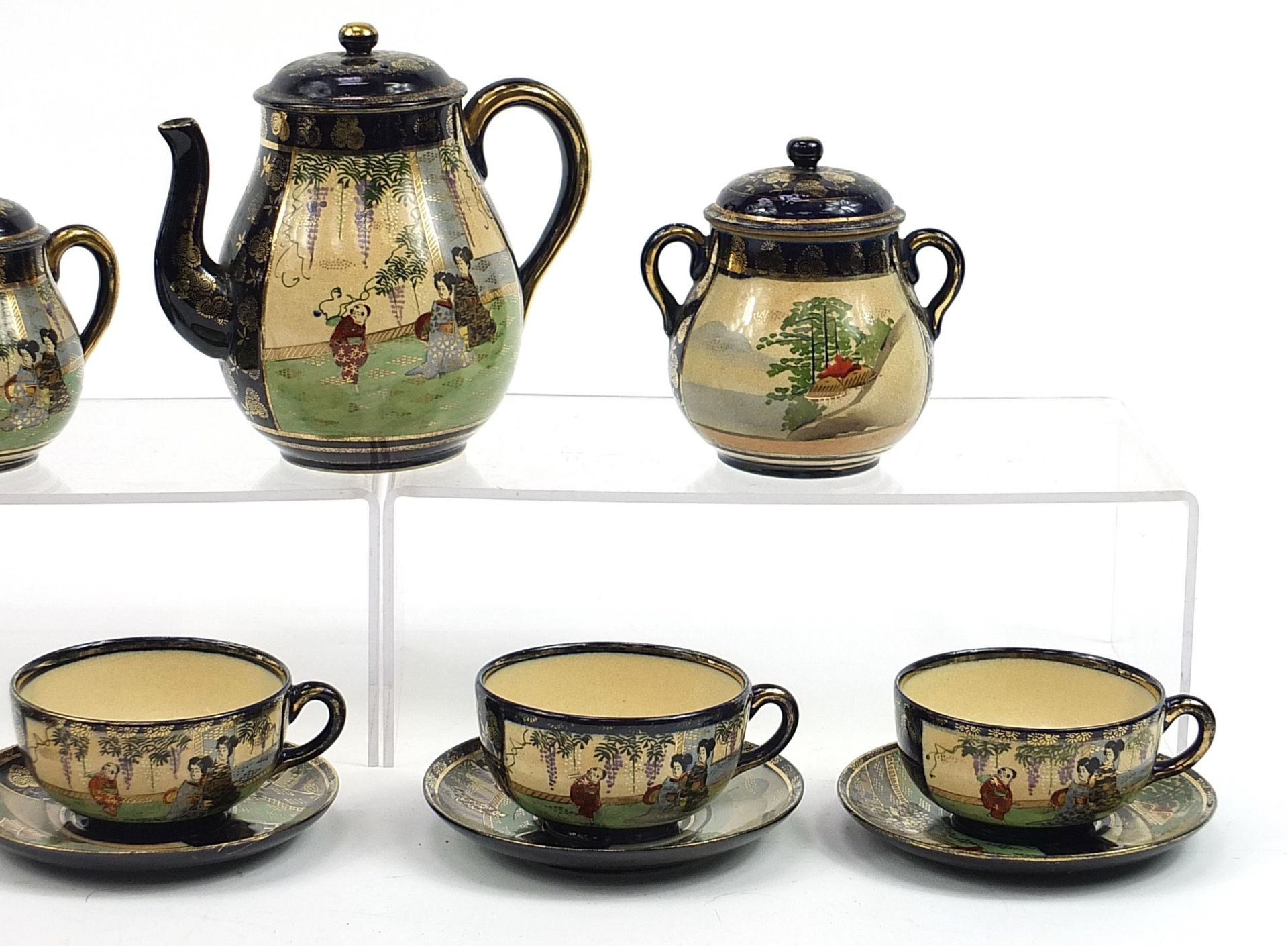 Japanese Satsuma part tea service including teapot, sugar bowl and milk jug, the teapot 16cm high - Image 3 of 4