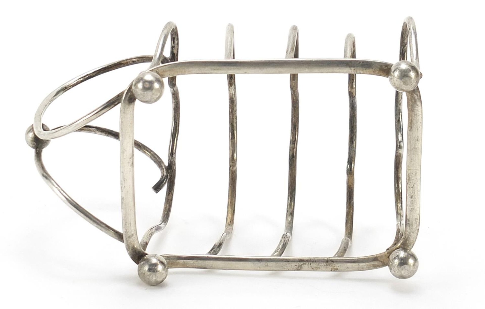 George Unite & Sons, Edward VII silver four slice toast rack with ball feet, London 1904, 12cm in - Image 3 of 4