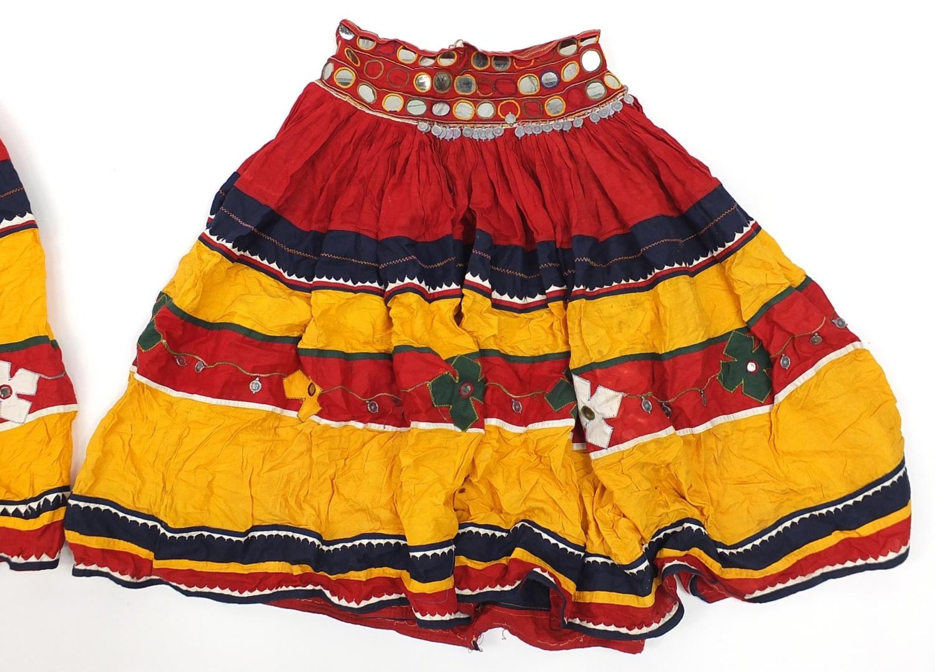 Two Middle Eastern or Indian mirrored embroidered skirts, possibly Banjara tribe, each 83cm high - Image 4 of 5