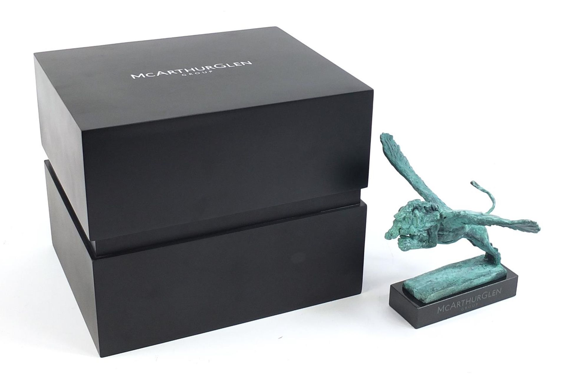 Mark Coreth for McArthur Glen group Verdigris bronze study of a winged lion raised on a