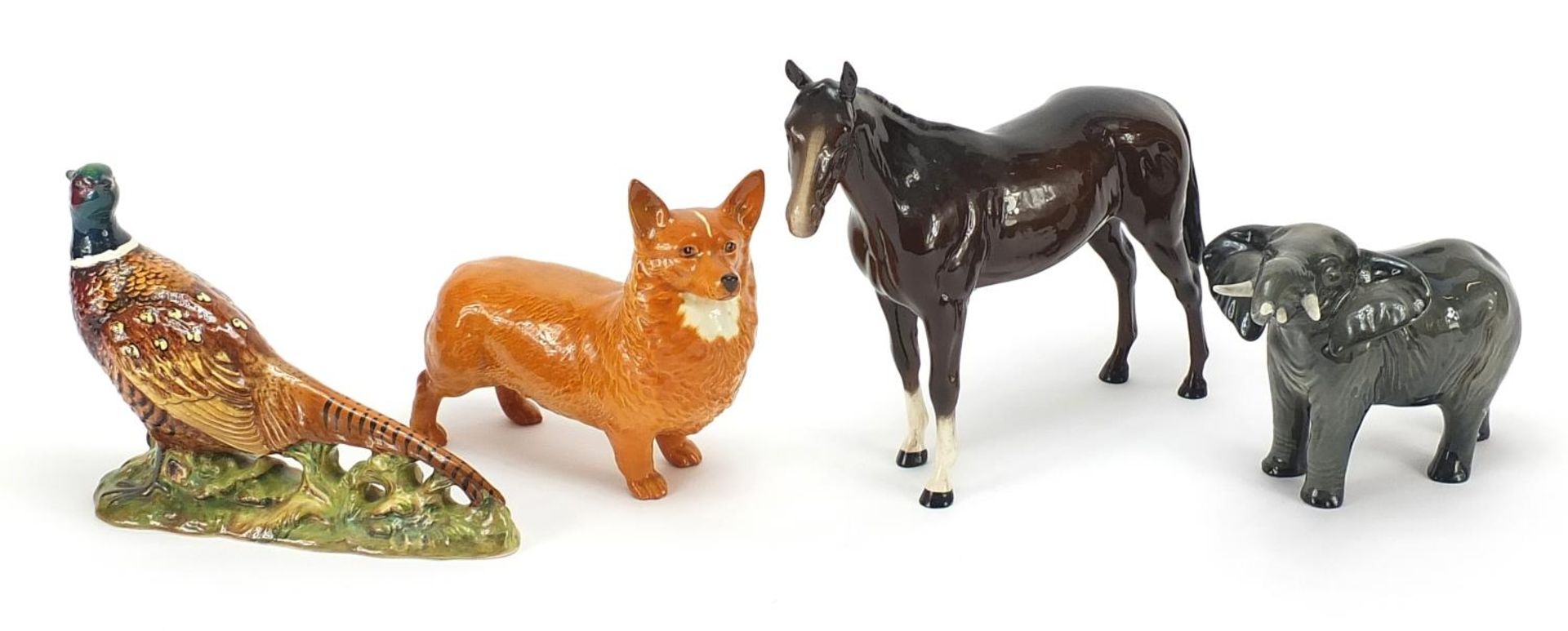 Four Beswick animals comprising horse, pheasant, Corgi and elephant, the largest 25cm in length