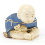 Japanese carved ivory netsuke of a child and rate by Ichiro Inada, signed to the base, 3.5cm high