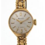 Accurist, ladies 9ct gold wristwatch with 9ct gold strap, 15mm in diameter, total weight 10.8g