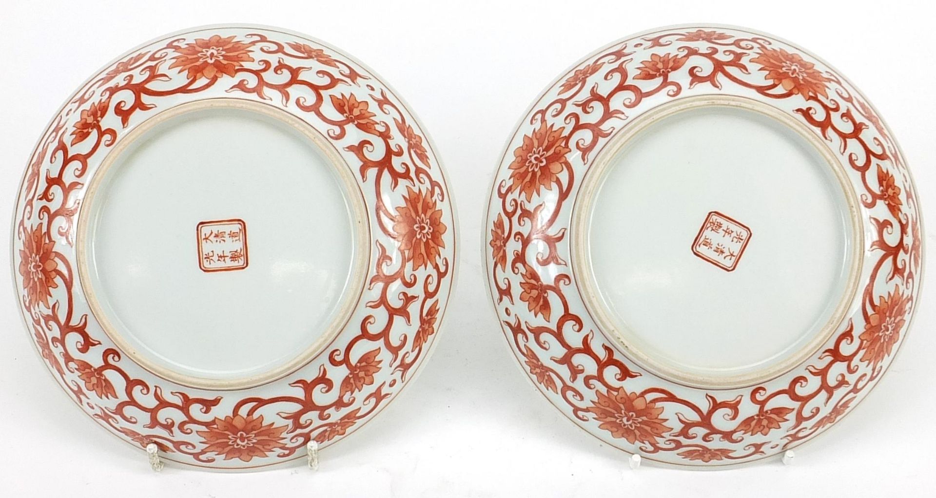 Pair of Chinese porcelain shallow dishes hand painted in iron red with bats and flower heads amongst - Image 2 of 2