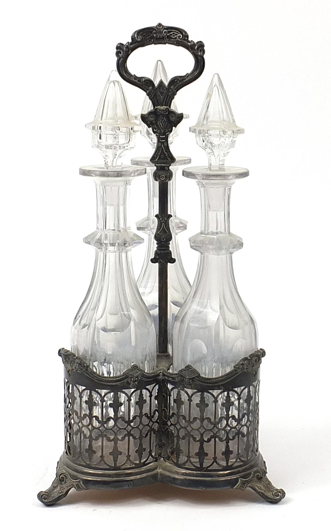 Three cut glass decanters housed in a silver plated tantalus, 42cm high - Image 2 of 3