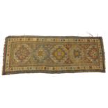 Middle Eastern carpet runner with all over geometric and animal design, 250cm x 94cm