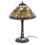 Bronzed Tiffany style leaded glass table lamp and shade decorated with dragonflies, 58cm high