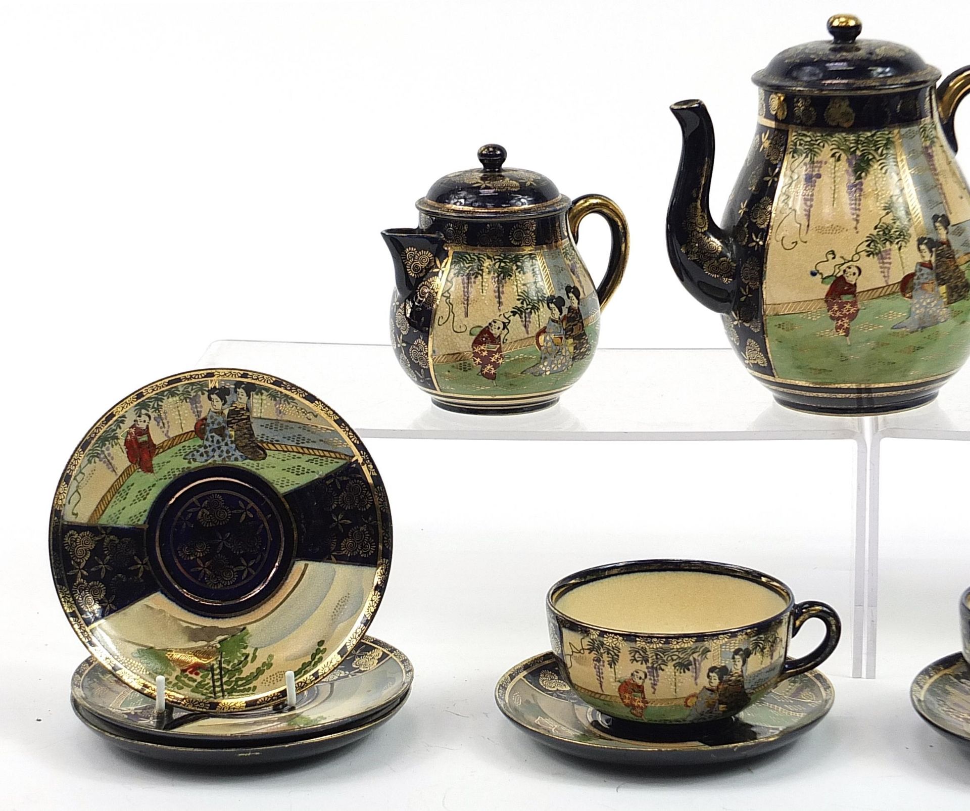 Japanese Satsuma part tea service including teapot, sugar bowl and milk jug, the teapot 16cm high - Image 2 of 4