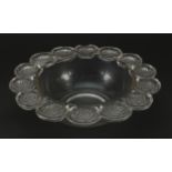 Rene Lalique, French glass bowl with flower head border, etched R Lalique France to the base, 26.5cm