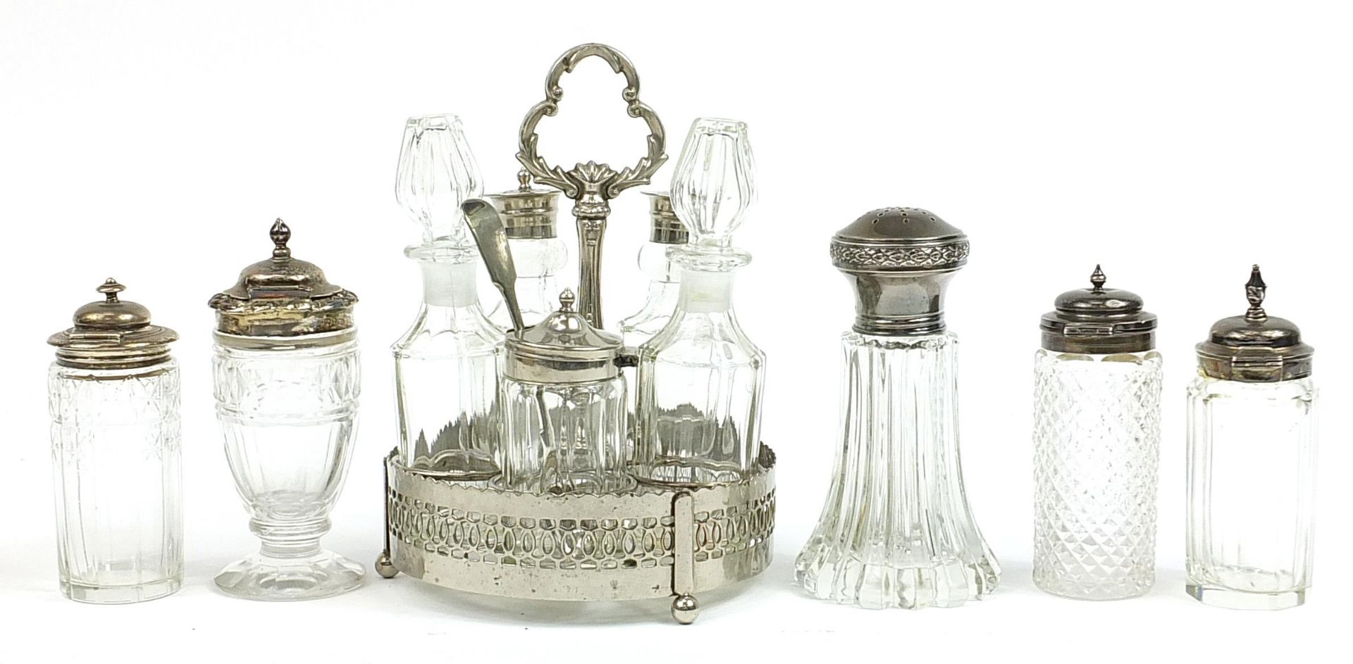 Glass bottle cruets including four Georgian and later with silver lids and a set of five on stand, - Image 2 of 3