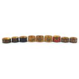 Nine Victorian treen napkin rings comprising Tunbridge Ware, Mauchline Ware and Tartanware,