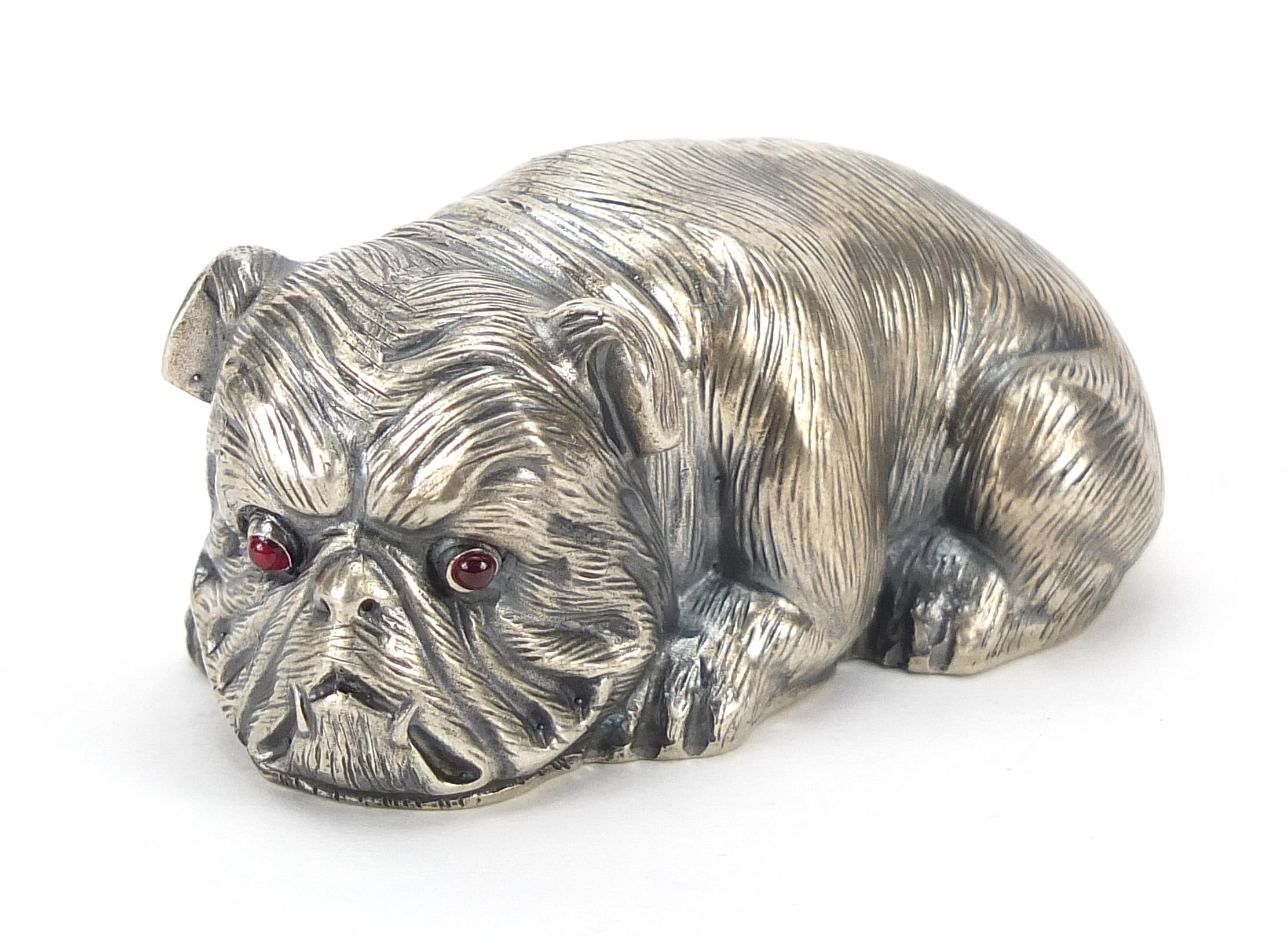 Silver English Bulldog paperweight with ruby eyes, impressed Russian marks to the base, 6.5cm
