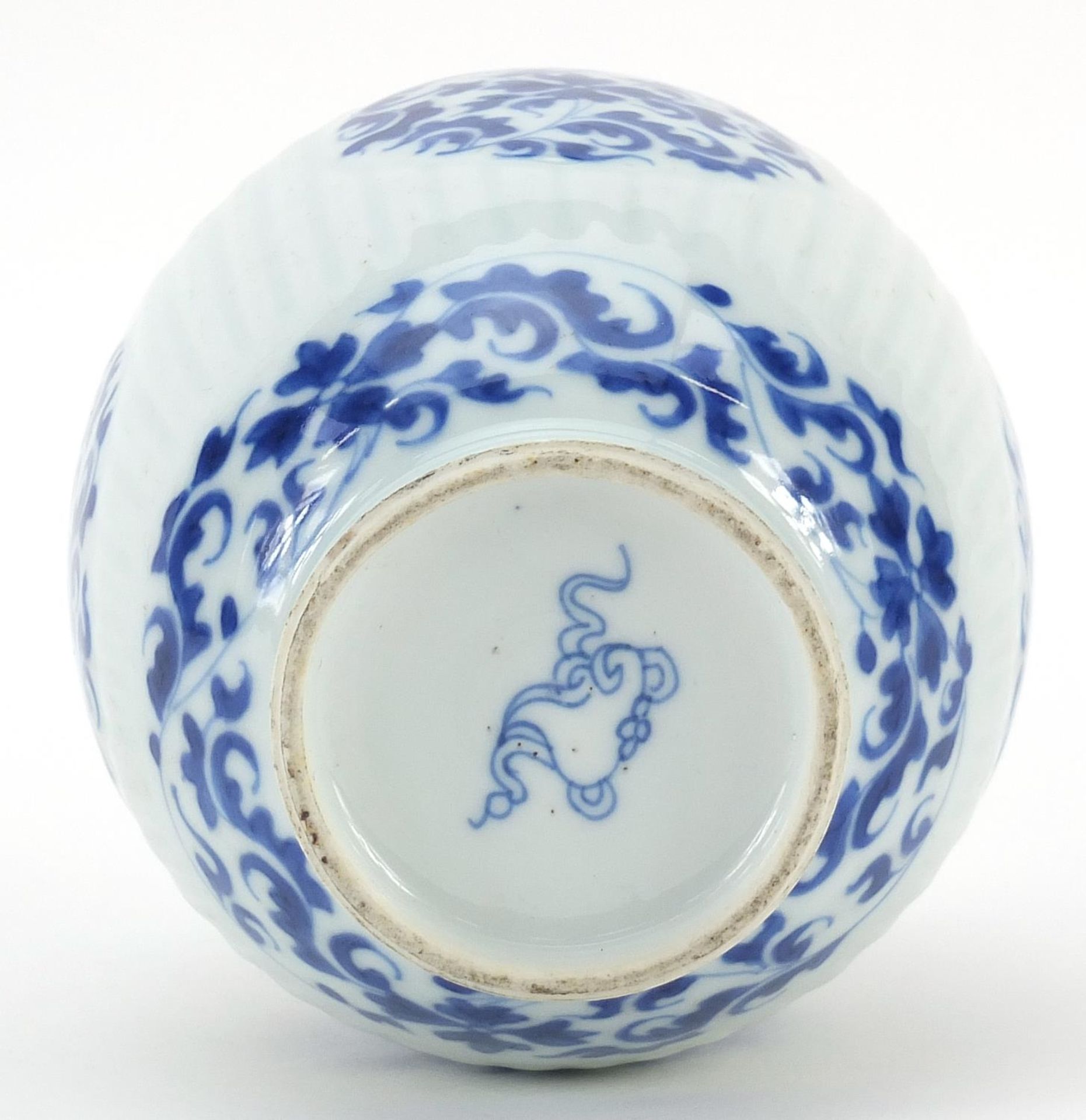 Chinese blue and white porcelain ribbed vase hand painted with flowers and scrolling foliage, Kangxi - Image 3 of 3